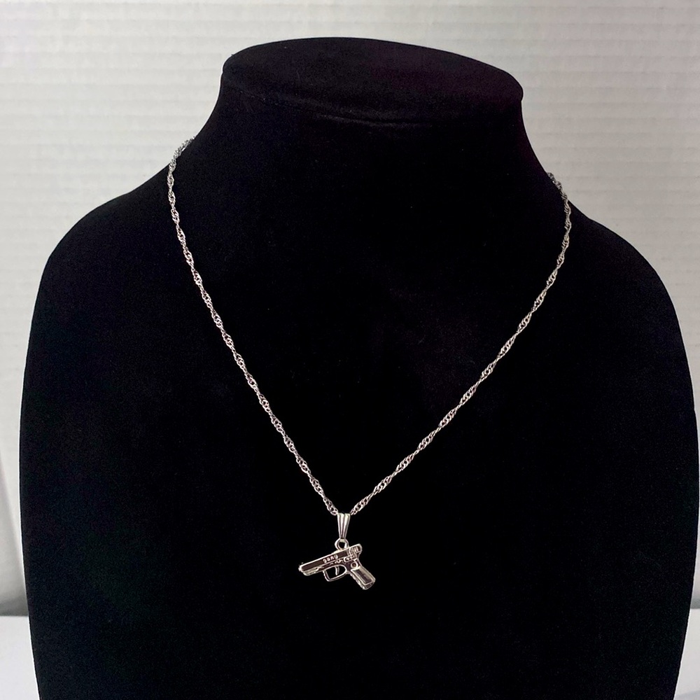 Silver Pistol Pendant Necklace – Twisted Chain Design